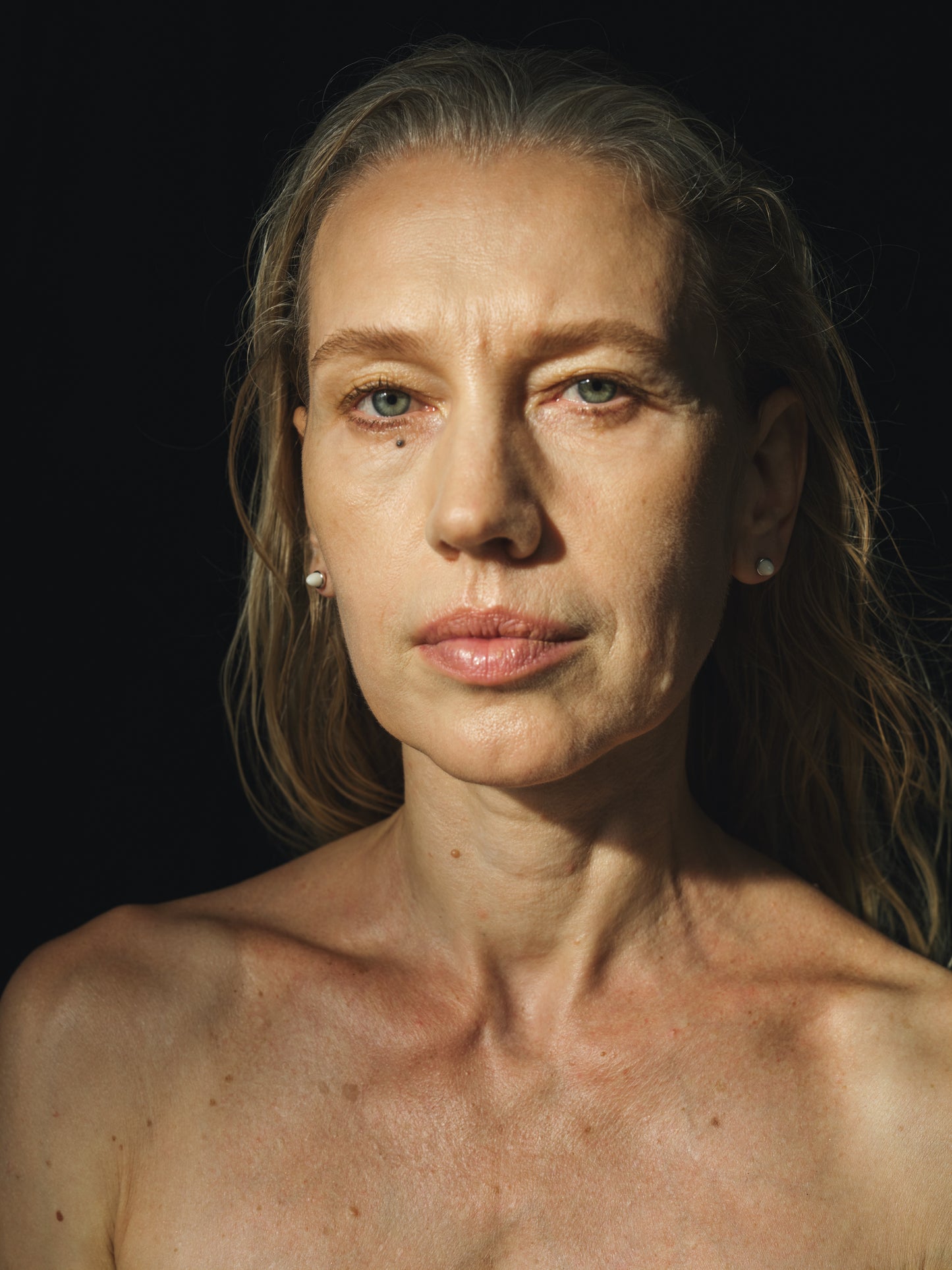 Ox bone teeth studs by RIVERLAKE, showcasing intricate design and natural texture in a stylish jewelry setting.