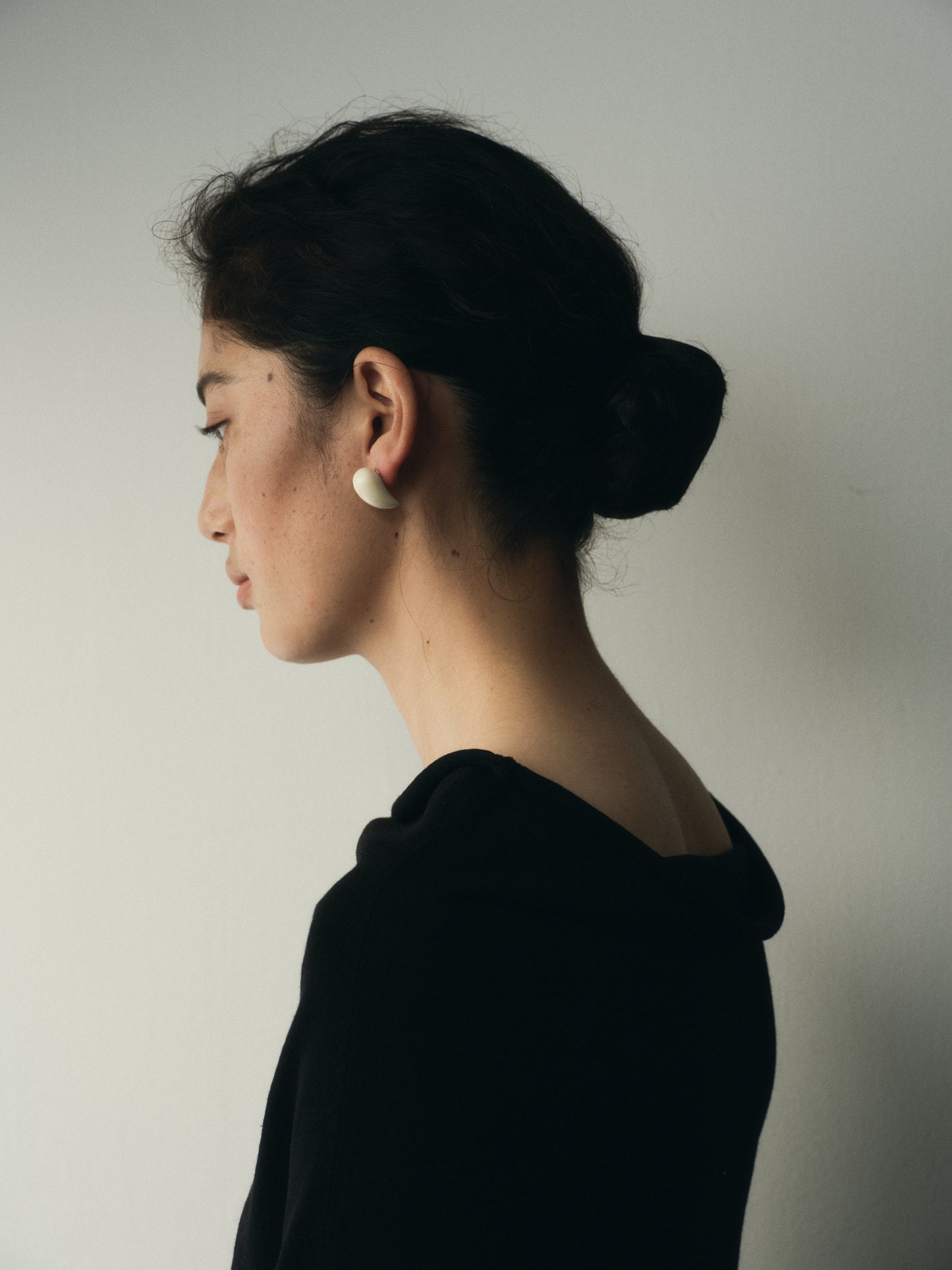 Small black buffalo horn fang earrings by RIVERLAKE, featuring a sleek, modern design perfect for everyday wear.