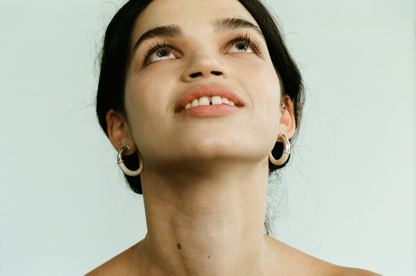 RIVERLAKE Arc Earrings in Antler featuring a unique curved design and natural texture.