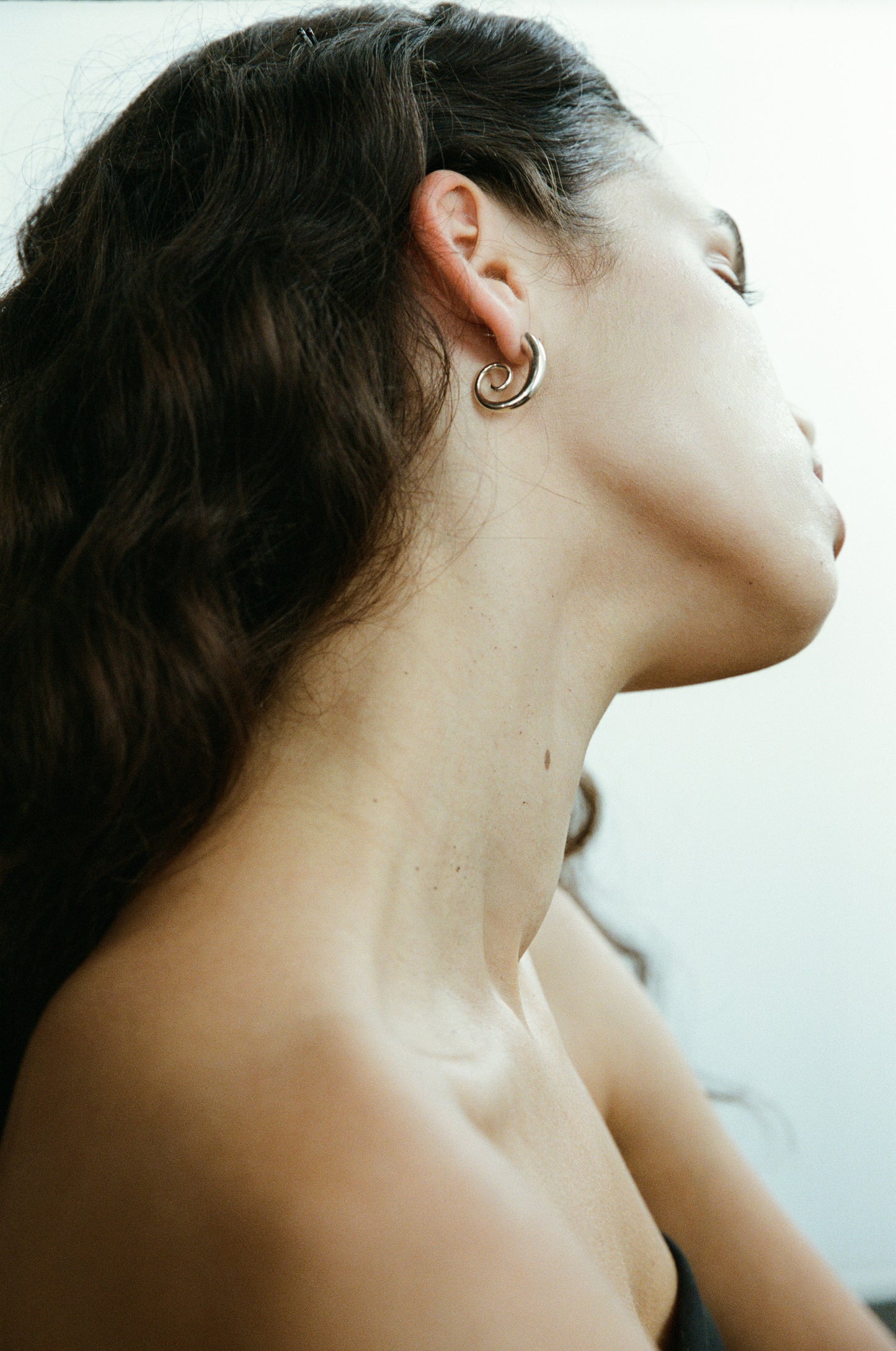 RIVERLAKE snail earrings featuring detailed design and a polished finish, set against a neutral background.