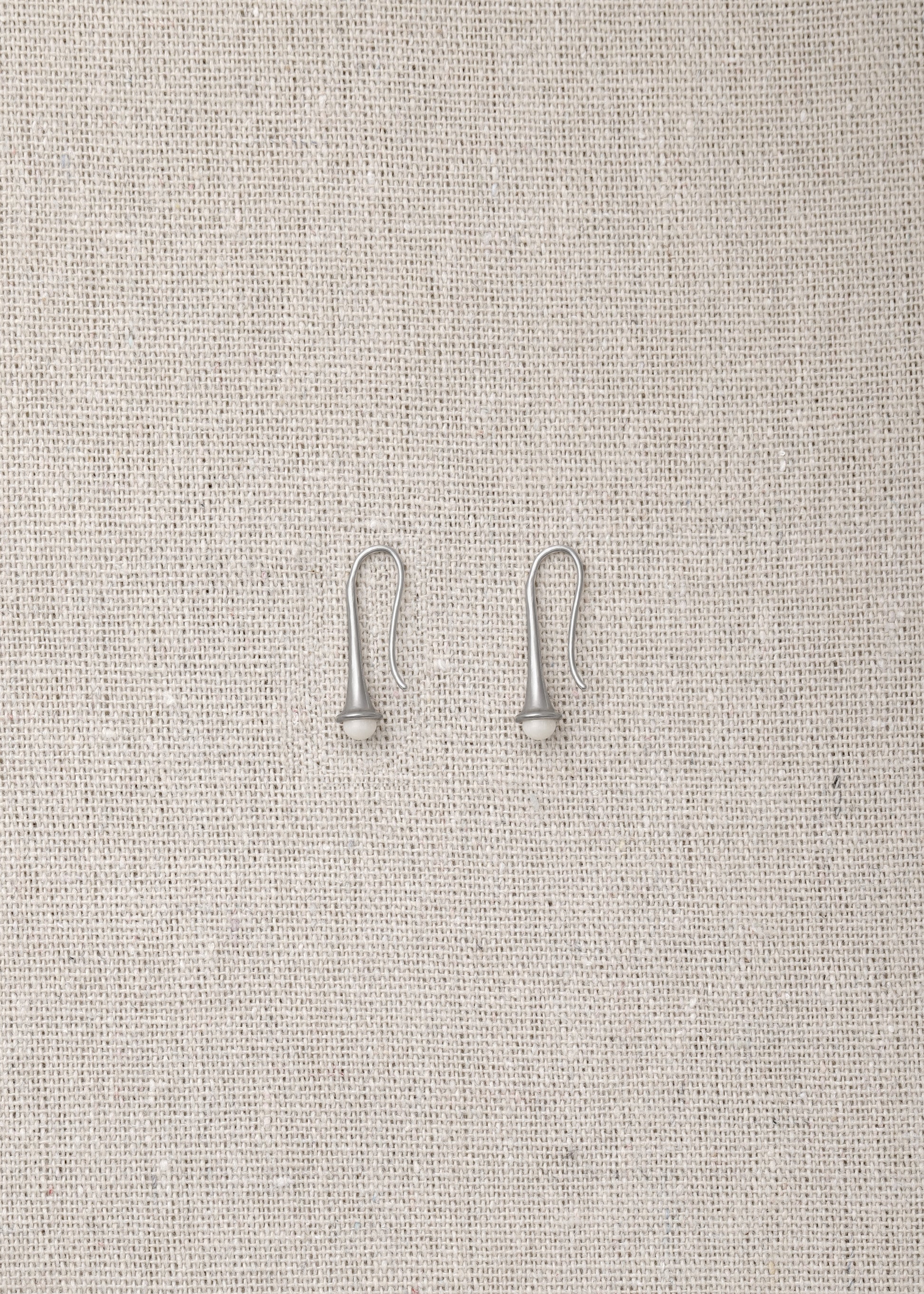 Ox bone Lilt earrings by RIVERLAKE featuring an elegant design and natural texture, perfect for any outfit.