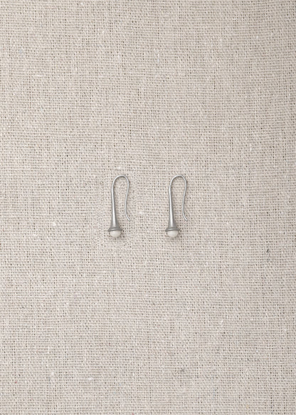 Ox bone Lilt earrings by RIVERLAKE featuring an elegant design and natural texture, perfect for any outfit.