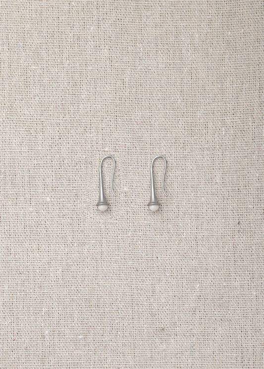 Ox bone Lilt earrings by RIVERLAKE featuring an elegant design and natural texture, perfect for any outfit.