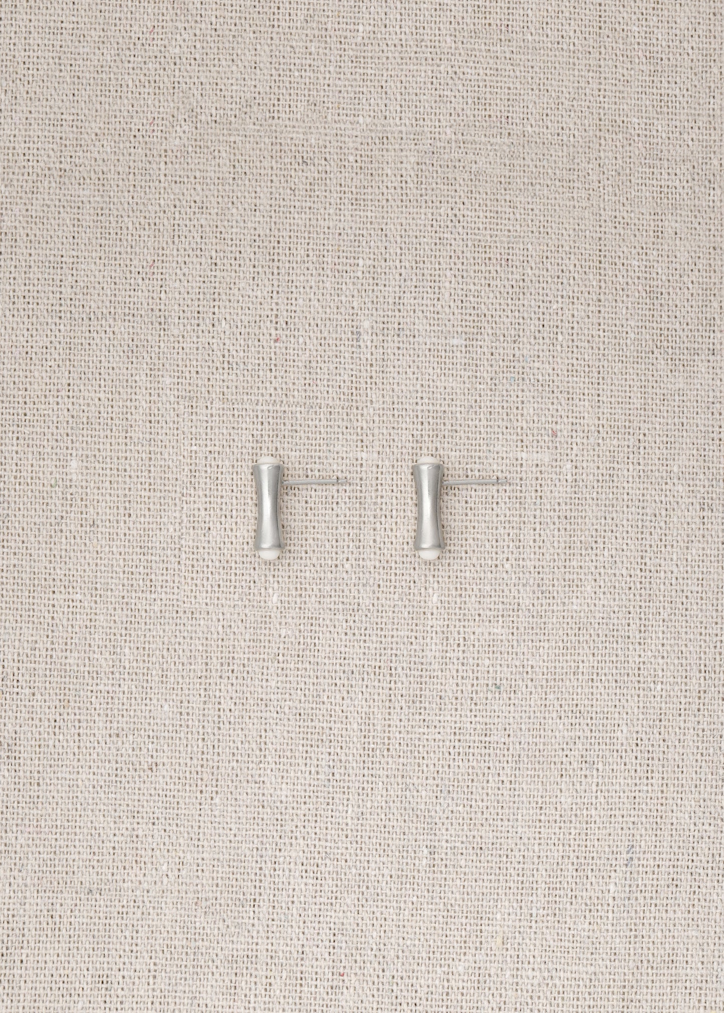 RIVERLAKE Cove Studs in Ox Bone showcasing elegant design with a smooth, natural finish and subtle texture.