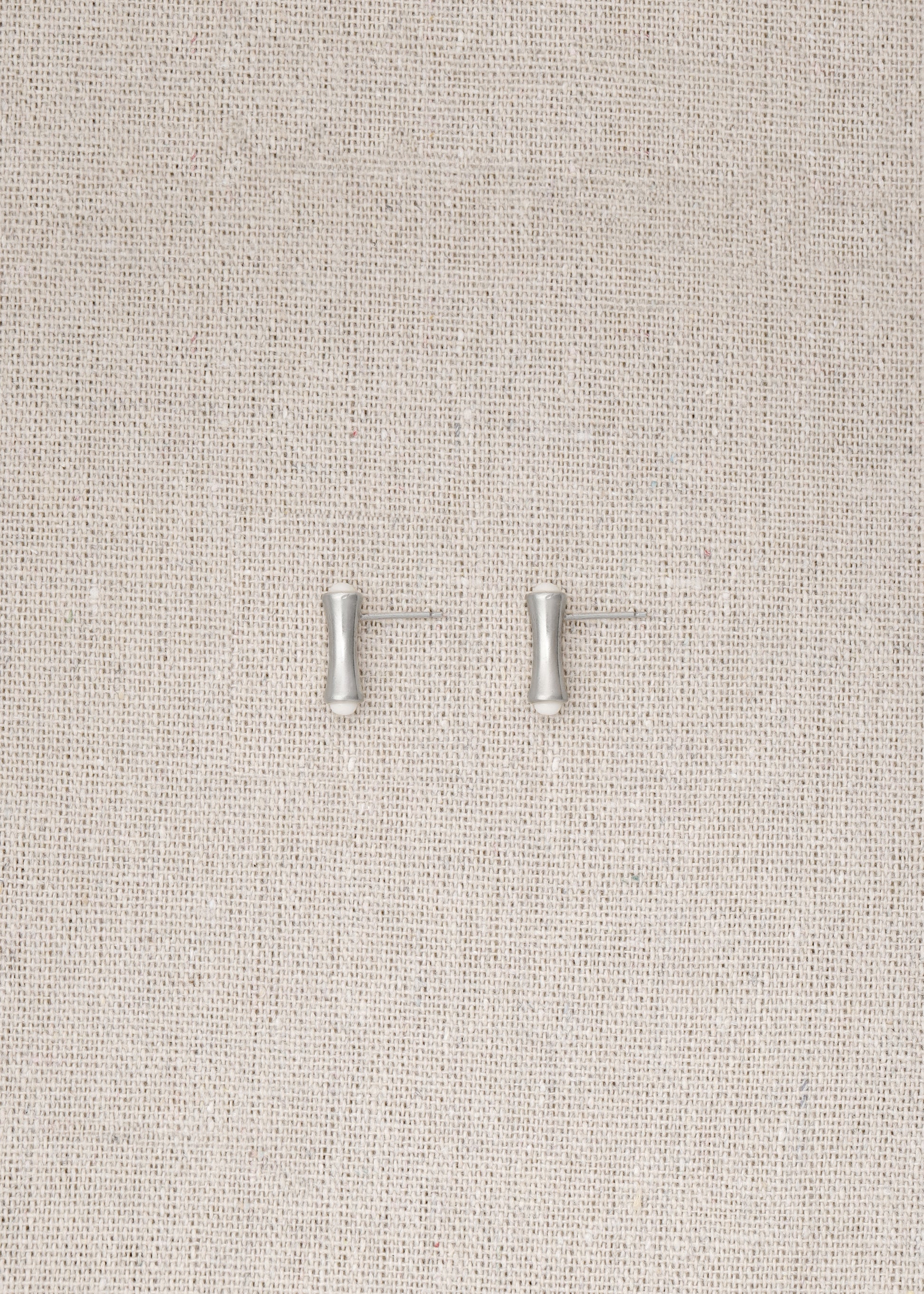RIVERLAKE Cove Studs in Ox Bone showcasing elegant design with a smooth, natural finish and subtle texture.