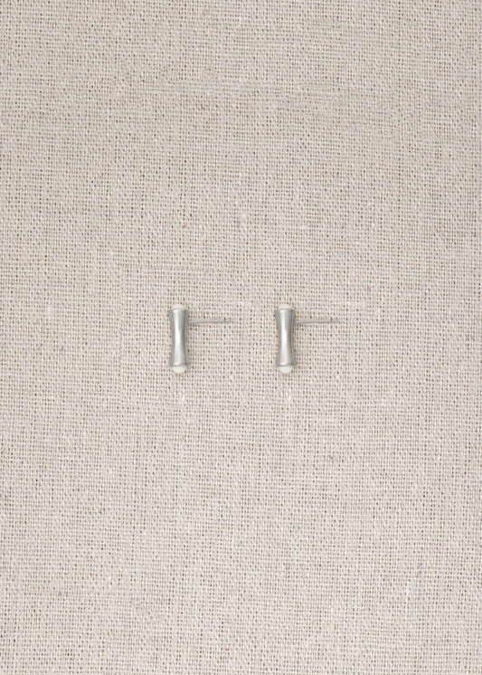 RIVERLAKE Cove Studs in Ox Bone showcasing elegant design with a smooth, natural finish and subtle texture.