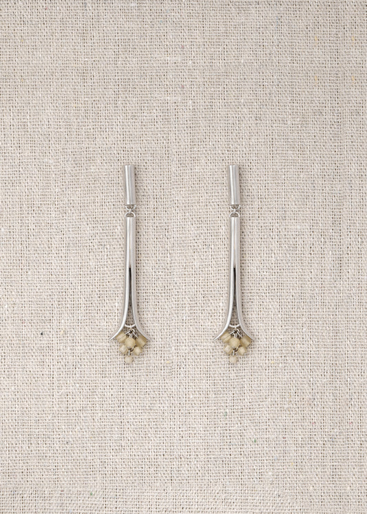 RIVERLAKE Oasis Earrings crafted from sheep horn, featuring a unique, organic shape and earthy tones.