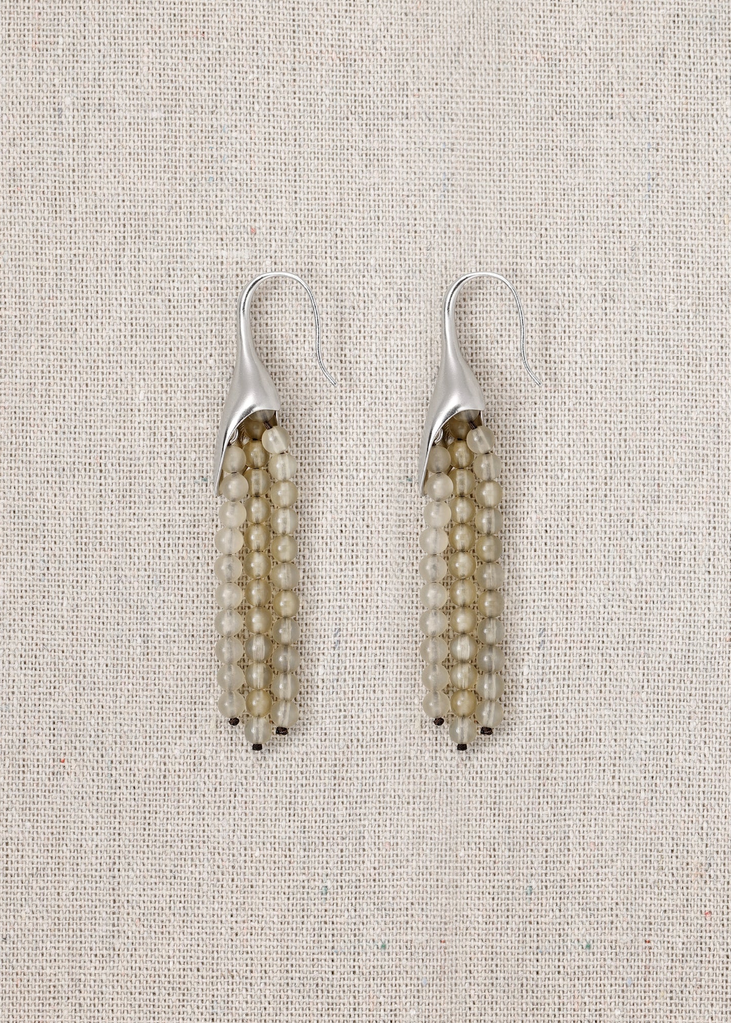 RIVERLAKE petal earrings made from sheep horn, featuring an elegant design and natural textures.
