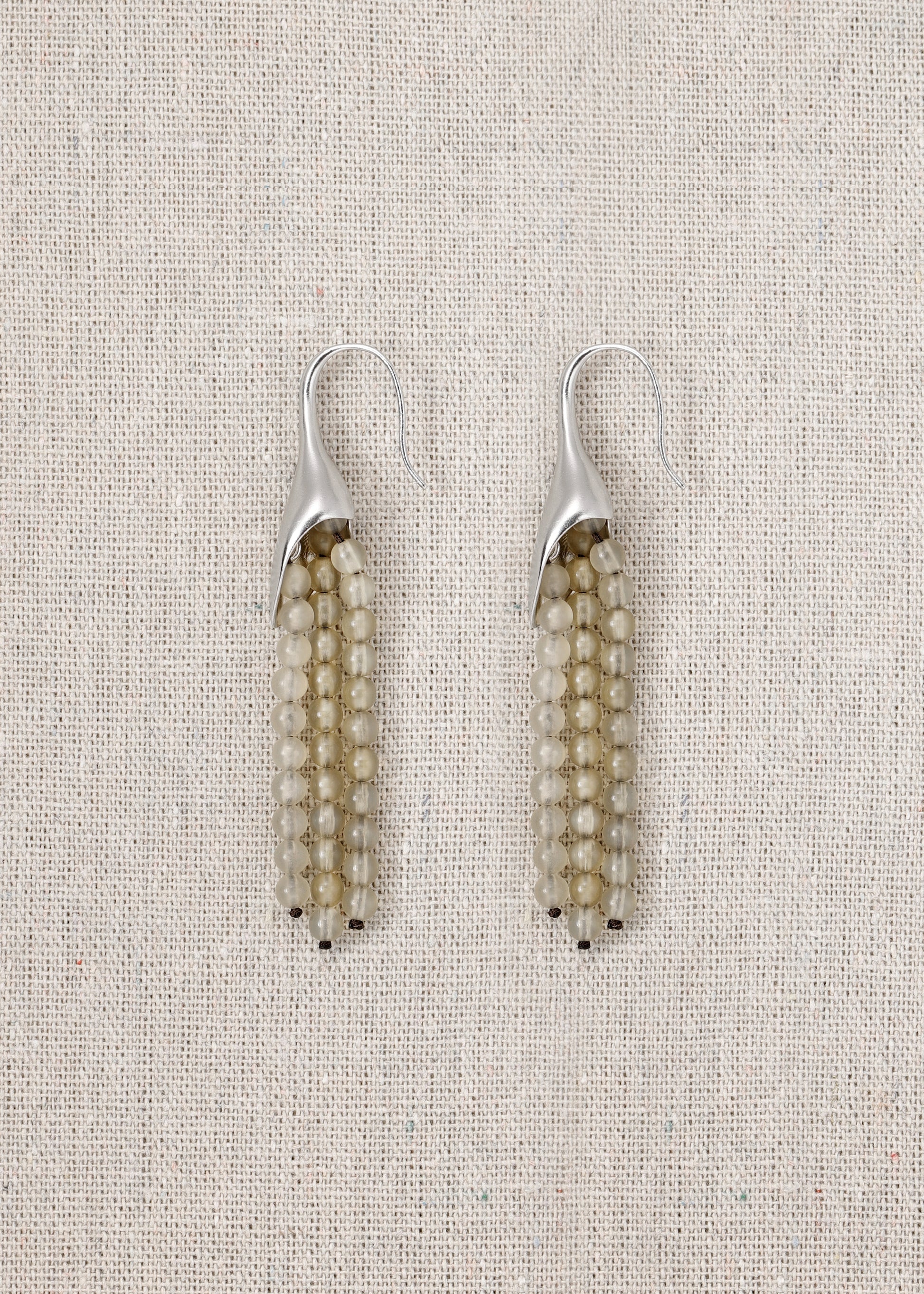 RIVERLAKE petal earrings made from sheep horn, featuring an elegant design and natural textures.