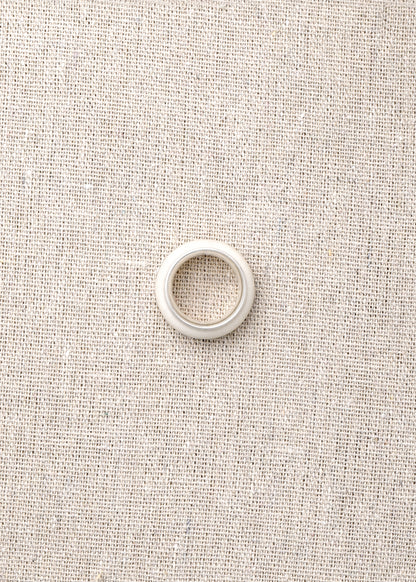 RIVERLAKE Karma Ring in Antler, showcasing a unique design with natural textures and earthy tones.