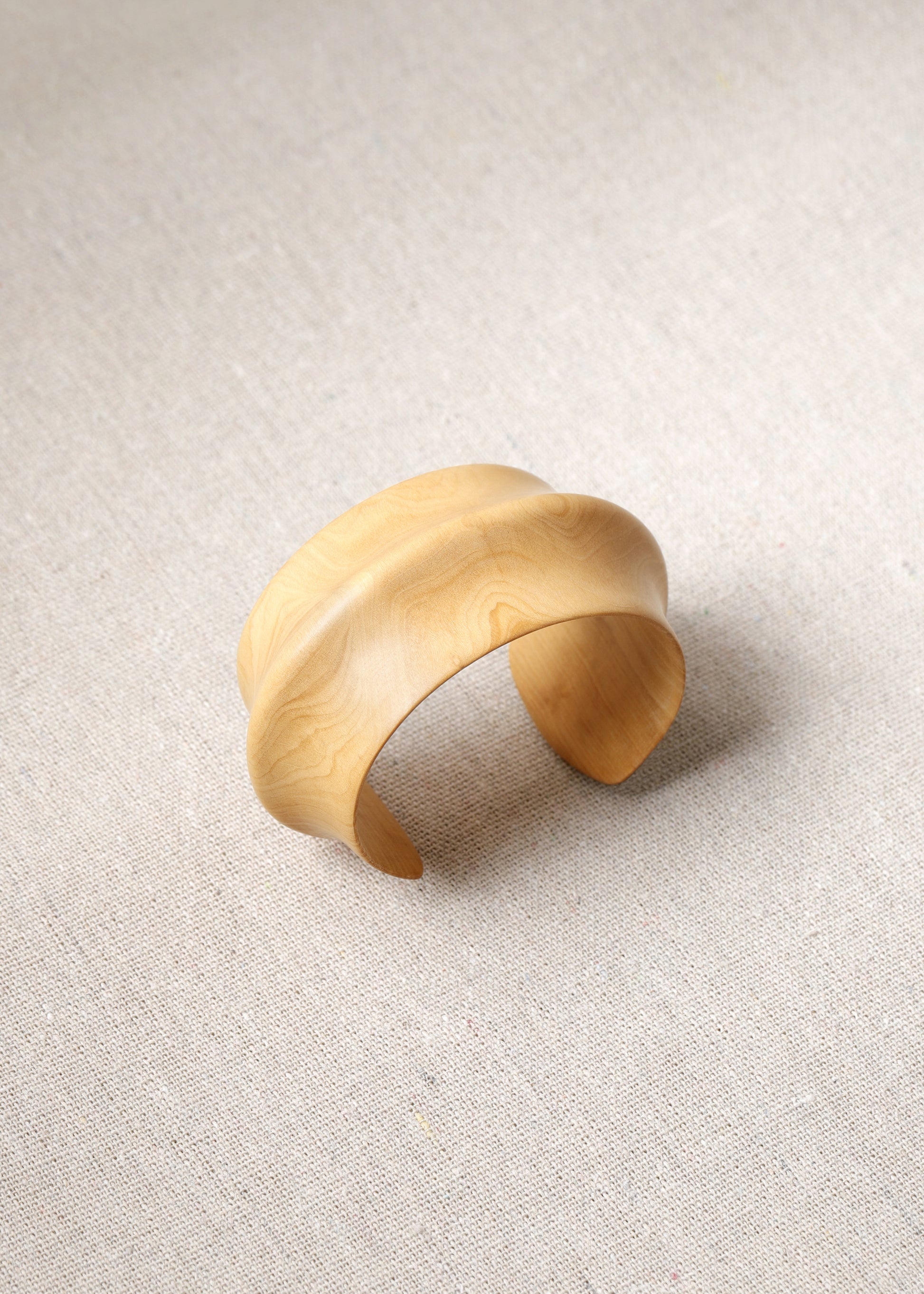 Aurelian cuff bracelet in boxwood by RIVERLAKE, featuring a smooth, natural wood finish and elegant design.