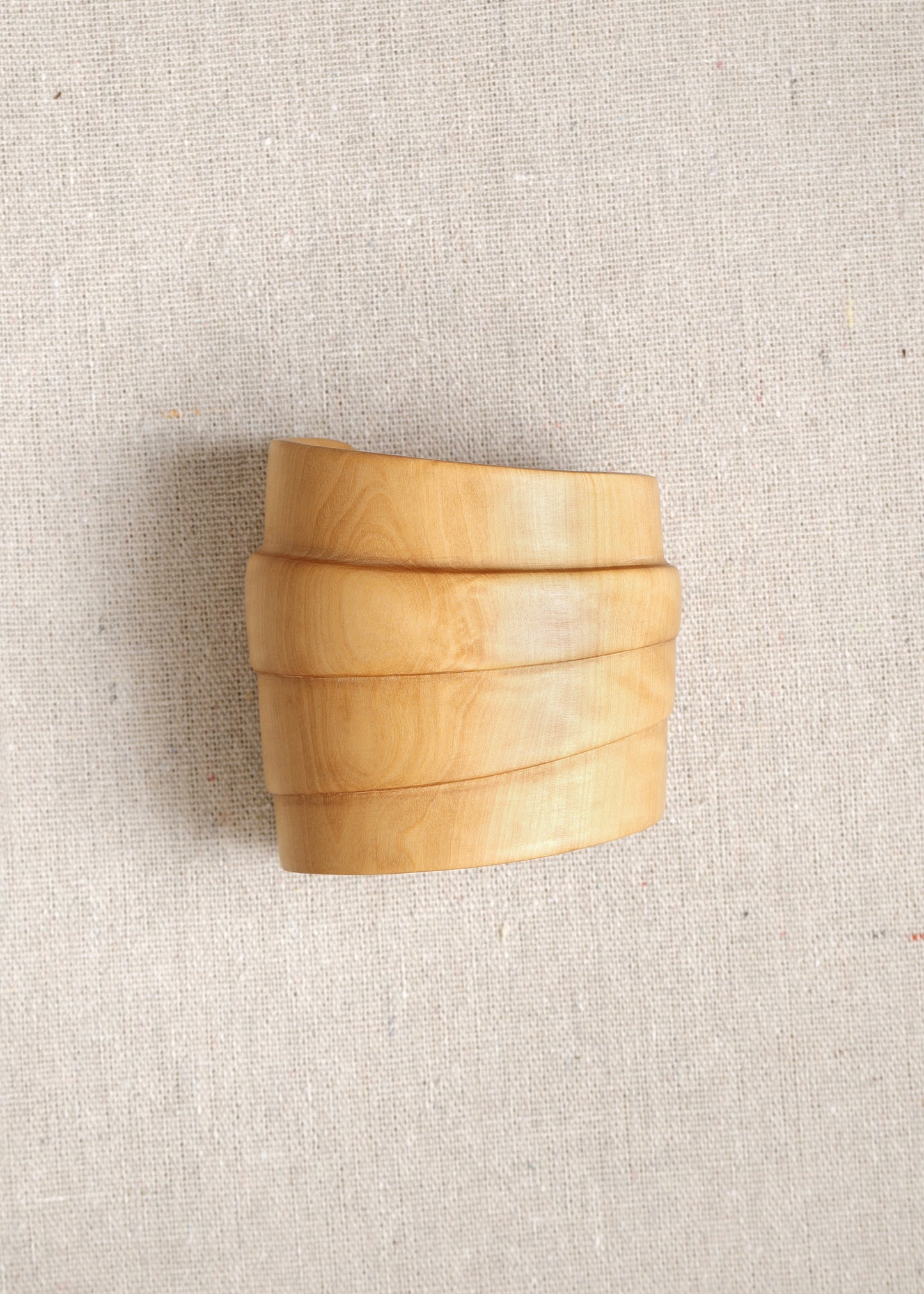 RIVERLAKE Strata Cuff in Boxwood, showcasing a sleek, modern design with a vibrant green hue and textured finish.