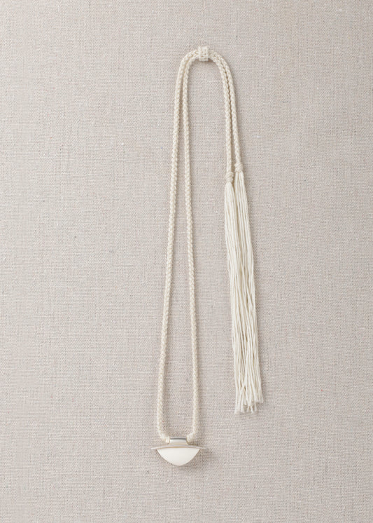 RIVERLAKE spade pendant crafted from antler with intricate detailing and a natural finish.