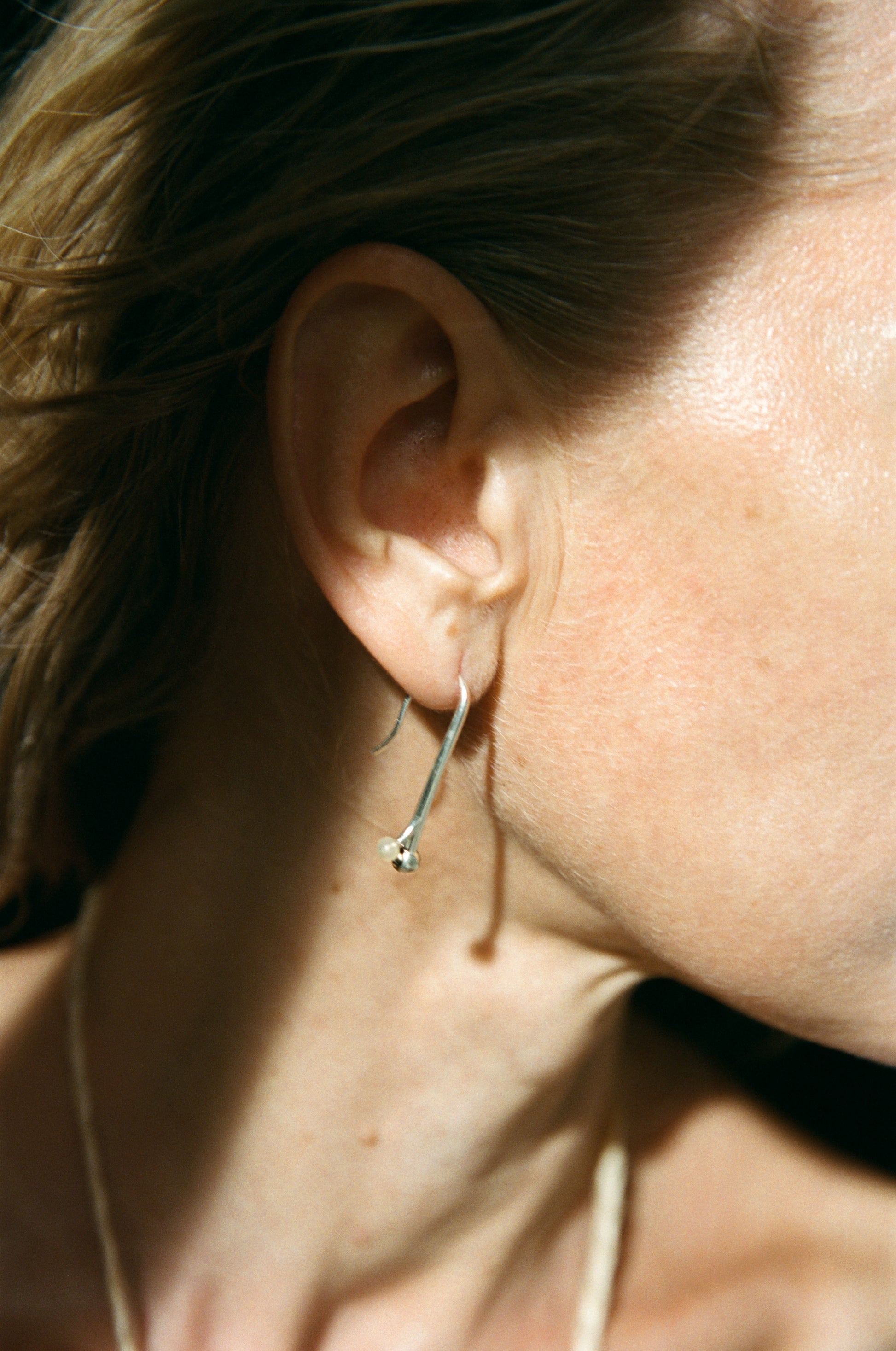 Short branch earrings made from sheep horn by RIVERLAKE, showcasing a unique, organic design with earthy tones.