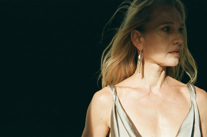 RIVERLAKE petal earrings made from sheep horn, showcasing a unique, organic design with a natural finish.