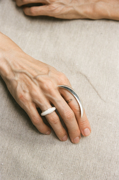 Black buffalo horn Karma ring by RIVERLAKE, showcasing a smooth, polished finish in an elegant design.