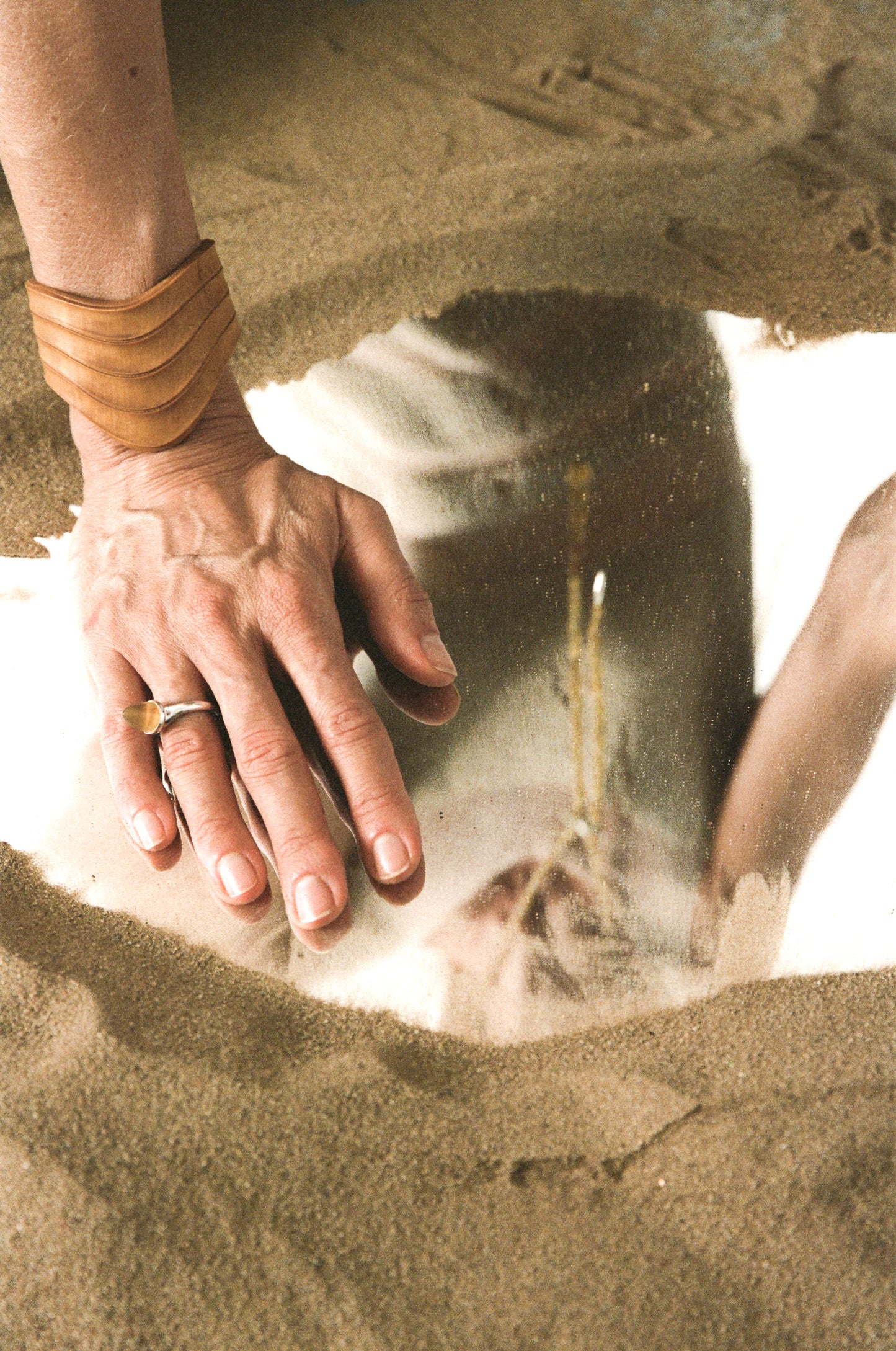 Drape cuff bracelet in boxwood from RIVERLAKE, showcasing intricate design and natural wood texture.