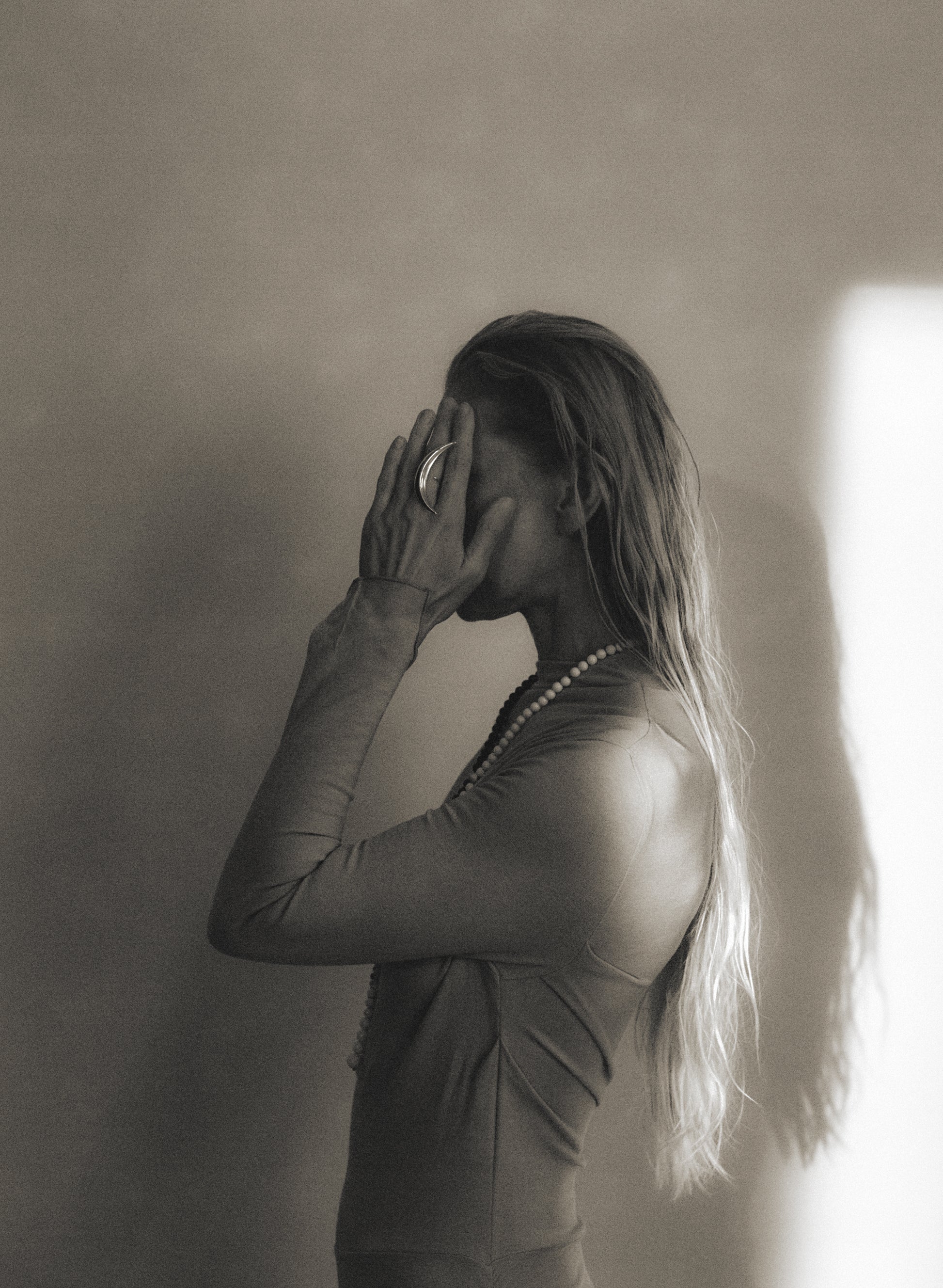 RIVERLAKE moon ring featuring a delicate crescent design with intricate detailing in silver metal.