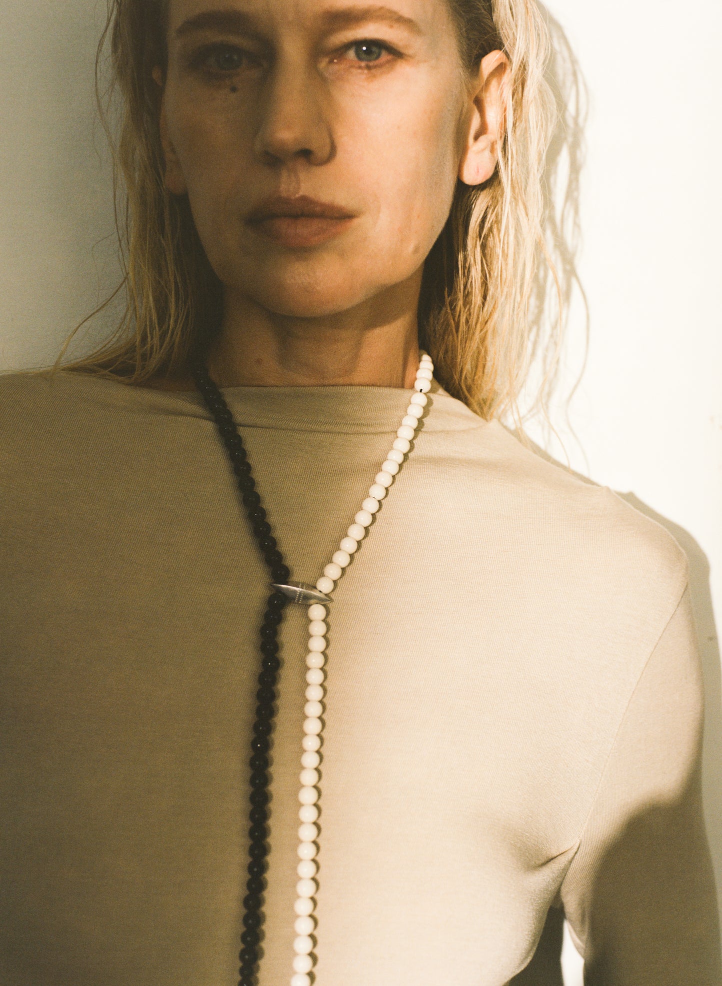 Fall necklace made from sheep horn by RIVERLAKE, showcasing earthy tones and unique natural textures.