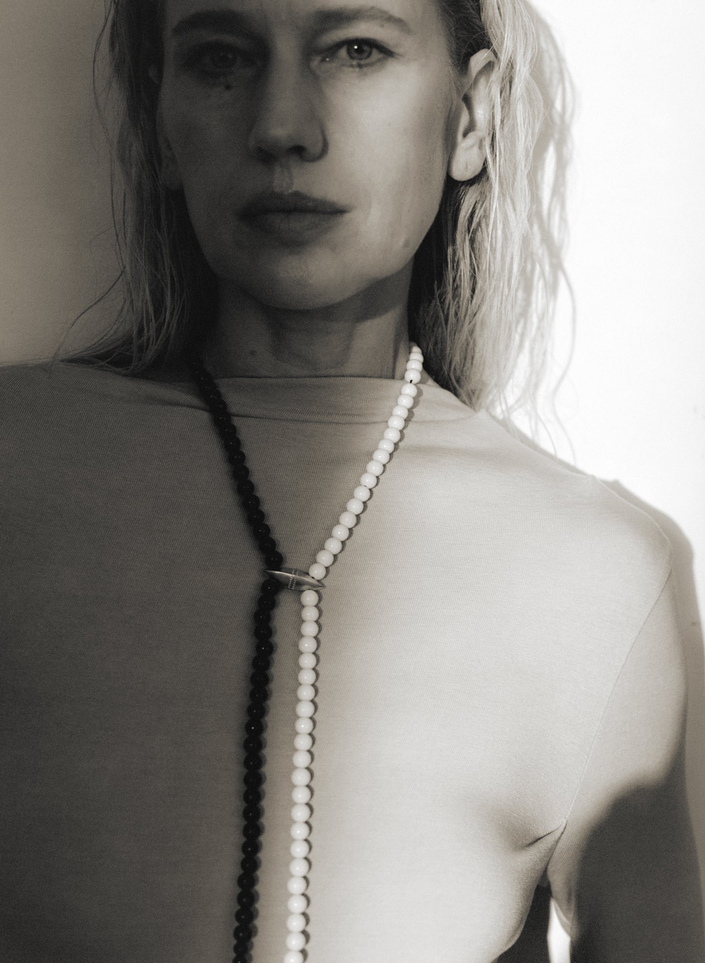 RIVERLAKE fall necklace featuring antler and black buffalo horn in a natural, earthy design.