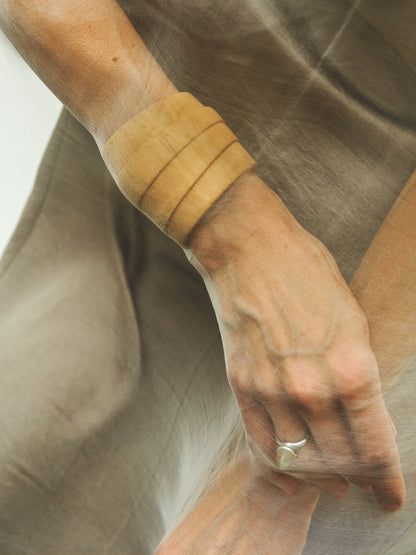 RIVERLAKE Strata Cuff in Boxwood featuring a sleek, modern design with a vibrant green hue and textured finish.