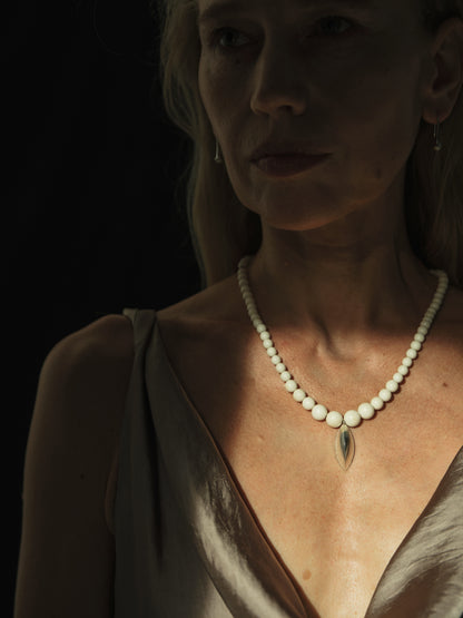 RIVERLAKE Legume Necklace featuring an antler pendant and delicate chain, showcasing a natural and earthy design.