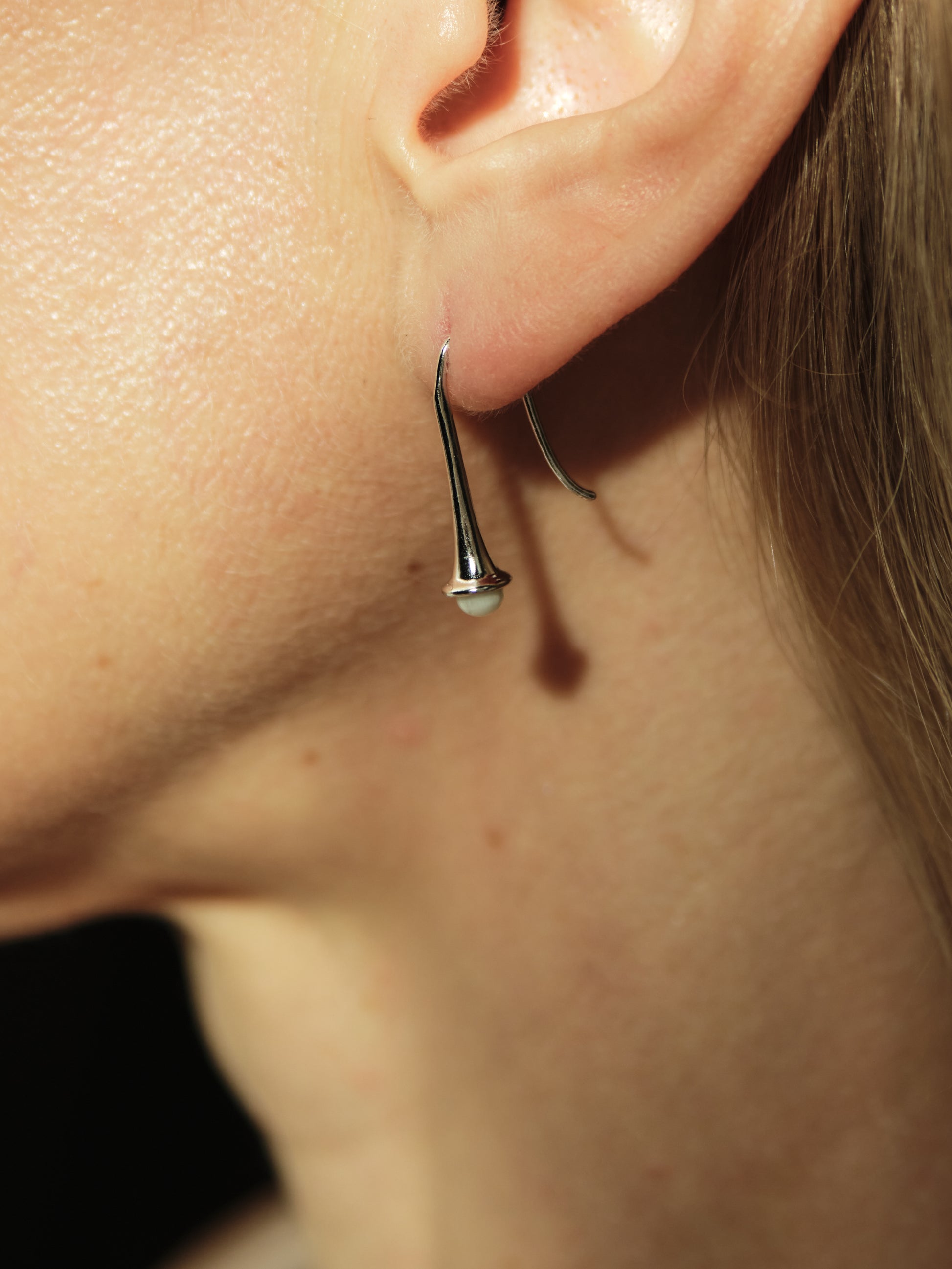 Lilt Earrings by RIVERLAKE featuring intricate ox bone design with a modern, elegant silhouette.