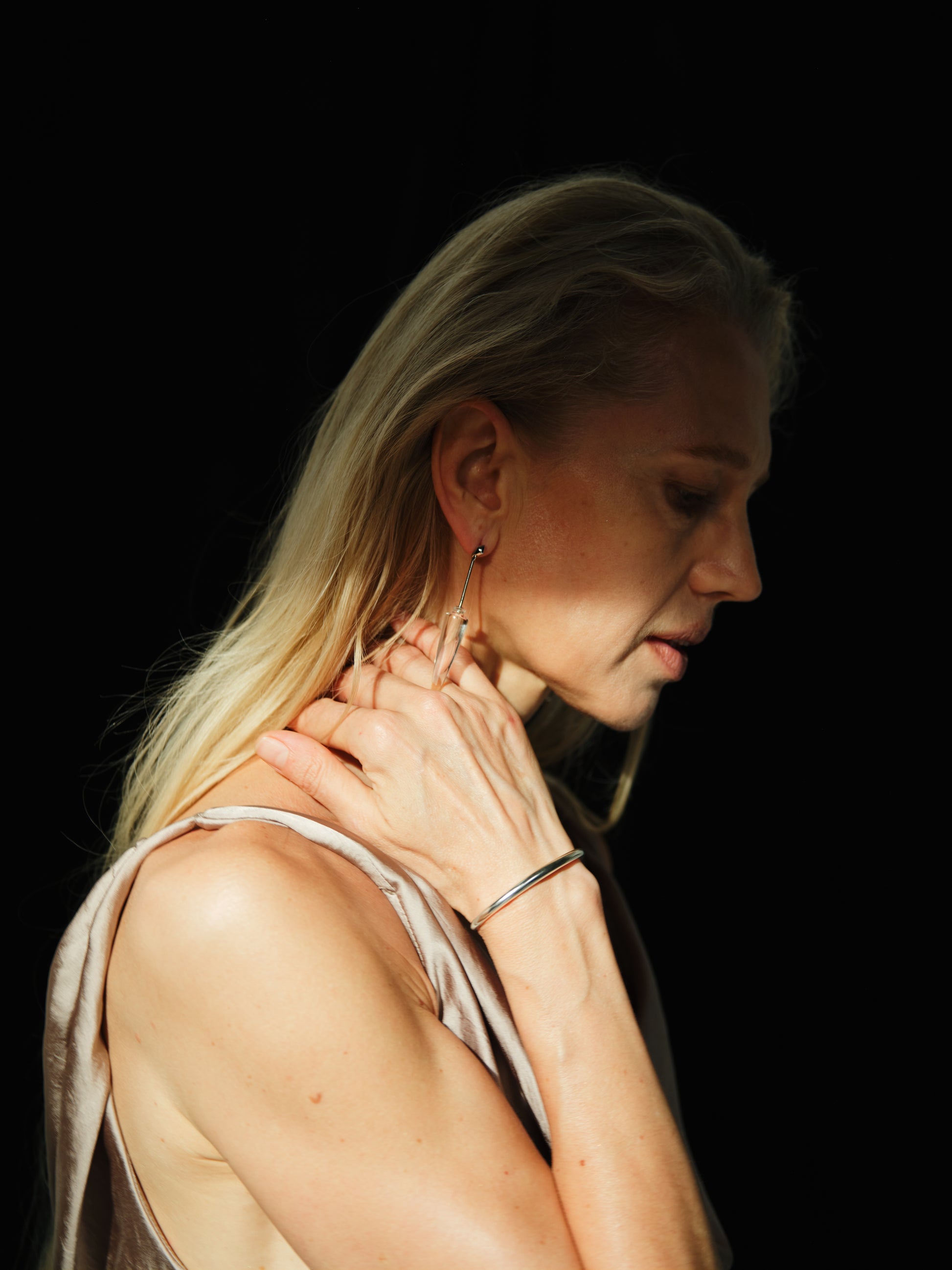 RIVERLAKE Gleam Wrist Cuff featuring a sleek design with a shiny finish and adjustable strap for a comfortable fit.