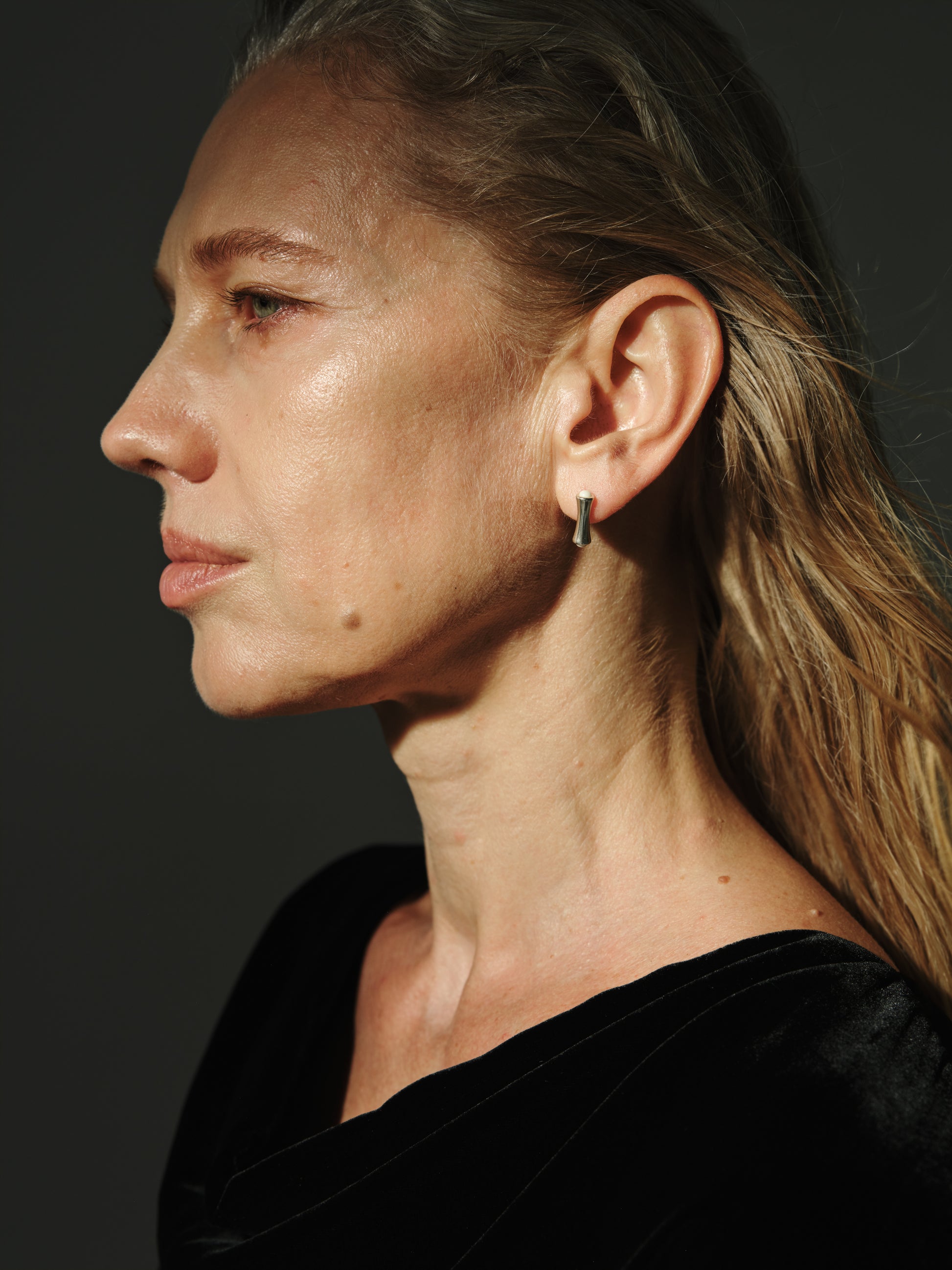 Cove Studs in Sheep Horn by RIVERLAKE, showcasing natural horn texture and elegant stud design.