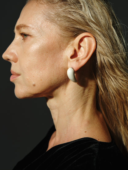 Medium Fang Earrings in Antler by RIVERLAKE showcasing a unique design with natural textures and earthy tones.