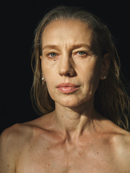 Ox bone teeth studs by RIVERLAKE, showcasing intricate design and natural texture in a stylish jewelry setting.