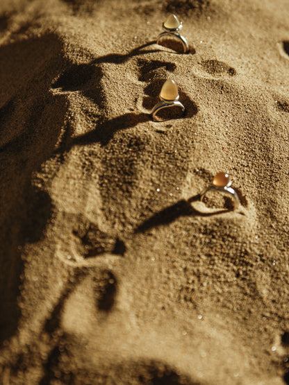 RIVERLAKE Nook Enclave Ring featuring unique sheep horn design, showcasing intricate textures and natural colors.