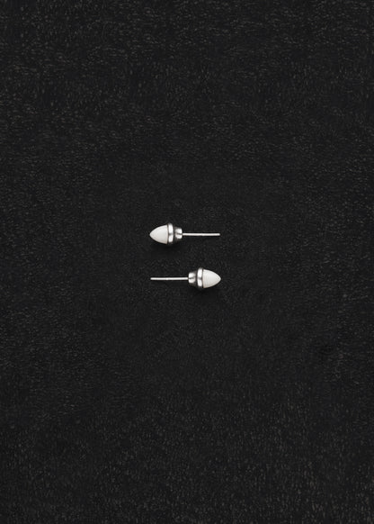 RIVERLAKE Ox Bone Teeth Studs showcasing intricate design and natural texture in a white finish.