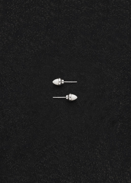 RIVERLAKE Ox Bone Teeth Studs showcasing intricate design and natural texture in a white finish.