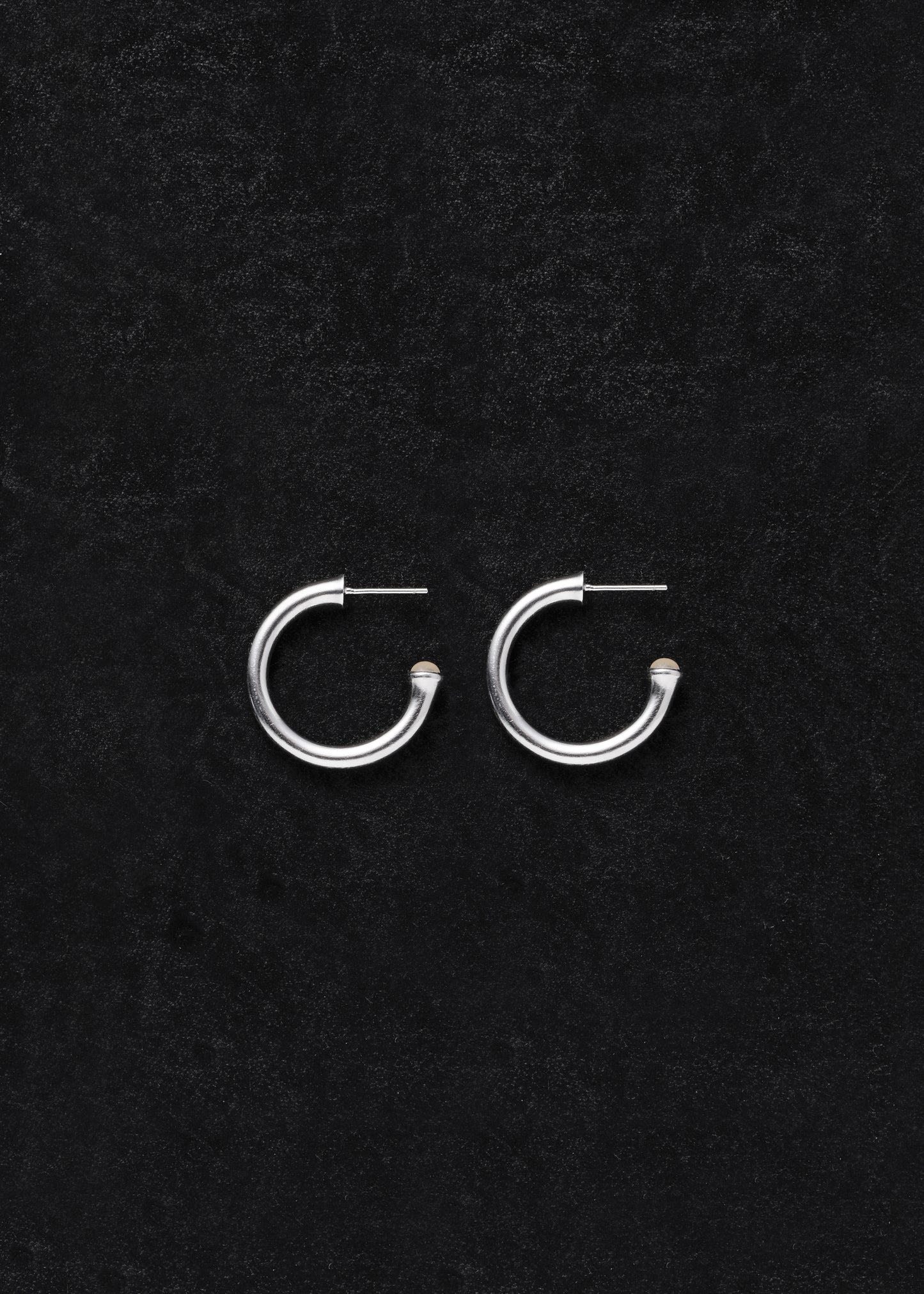 Small yellow buffalo horn signature hoops by RIVERLAKE, featuring a sleek, modern design perfect for everyday wear.