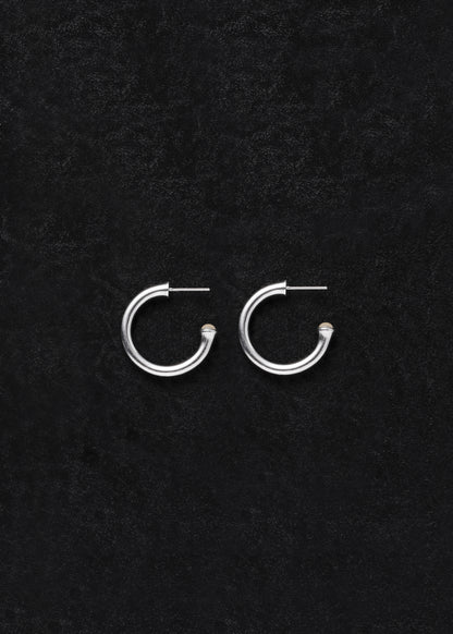 Small yellow buffalo horn signature hoops by RIVERLAKE, featuring a sleek, modern design perfect for everyday wear.