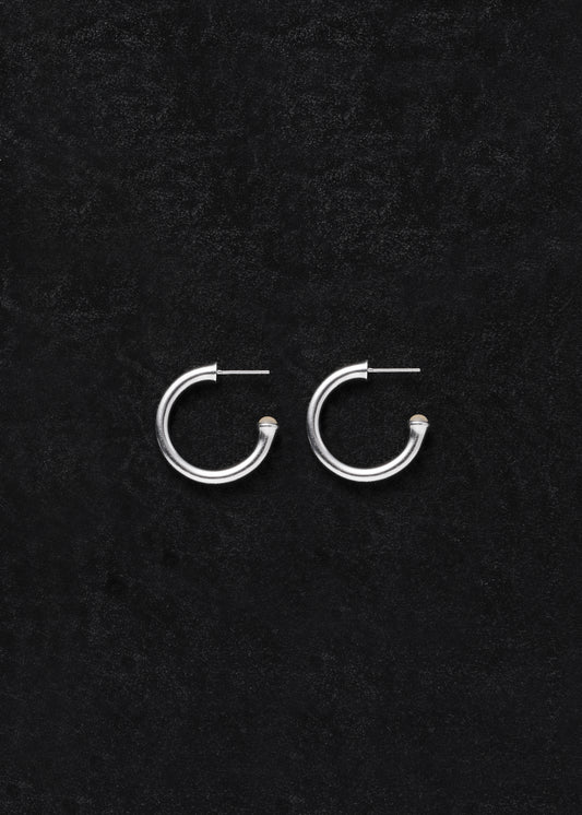 Small yellow buffalo horn signature hoops by RIVERLAKE, featuring a sleek, modern design perfect for everyday wear.