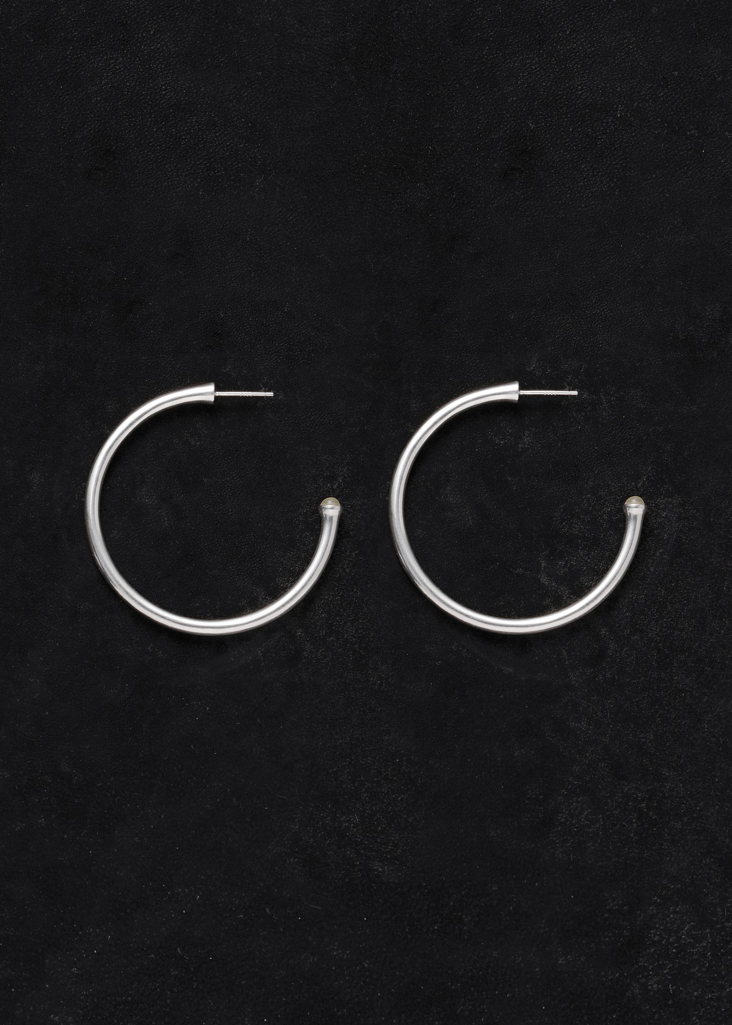 Large yellow buffalo horn signature hoops by RIVERLAKE, showcasing a unique textured design with a polished finish.