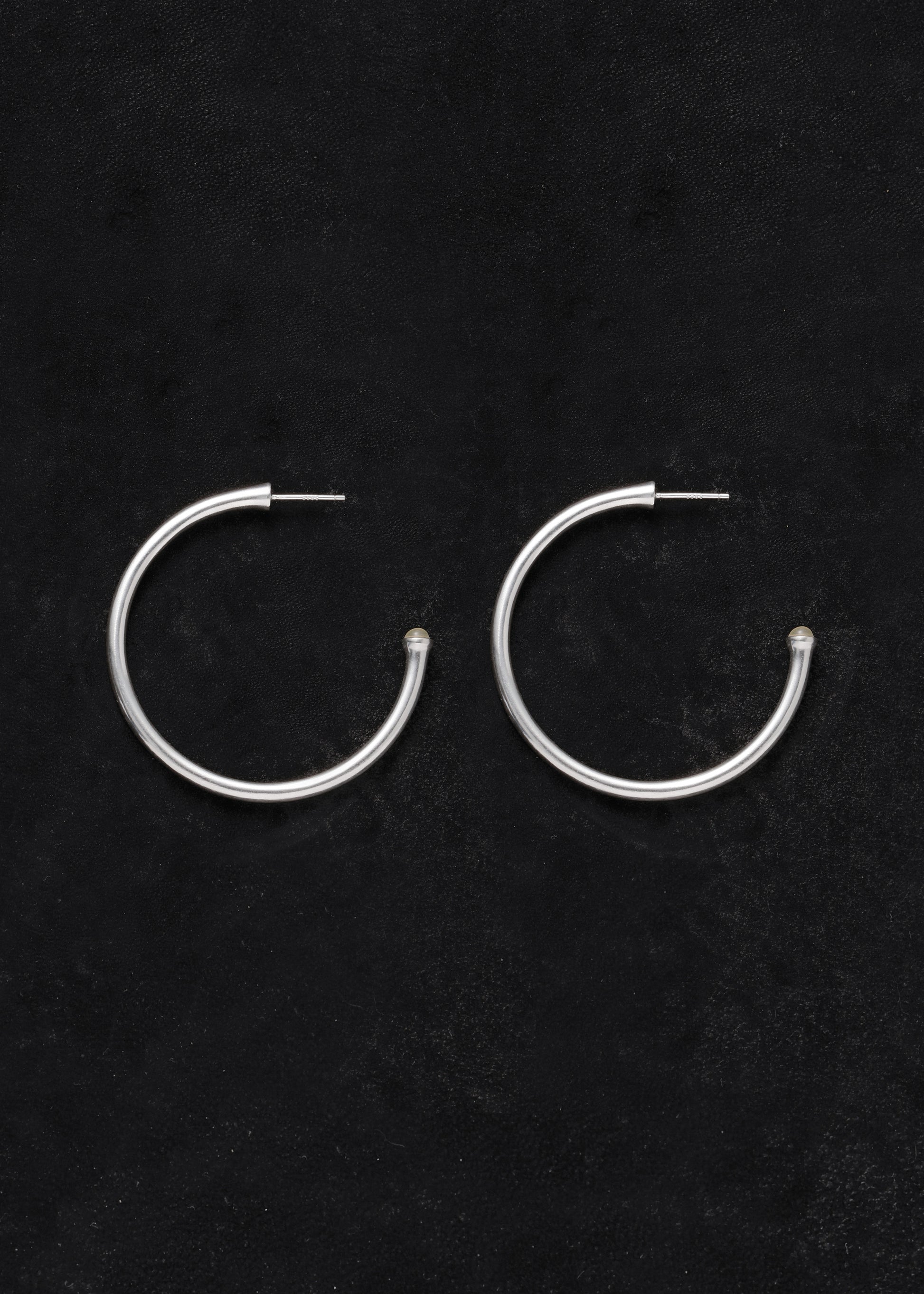 Large yellow buffalo horn signature hoops by RIVERLAKE, showcasing a unique textured design with a polished finish.