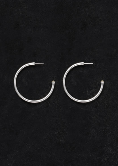 Large yellow buffalo horn signature hoops by RIVERLAKE, showcasing a unique textured design with a polished finish.