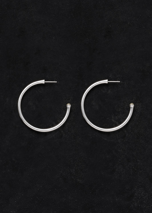 Large yellow buffalo horn signature hoops by RIVERLAKE, showcasing a unique textured design with a polished finish.