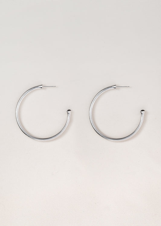 Large black buffalo horn signature hoop earrings by RIVERLAKE, showcasing a sleek and elegant design.