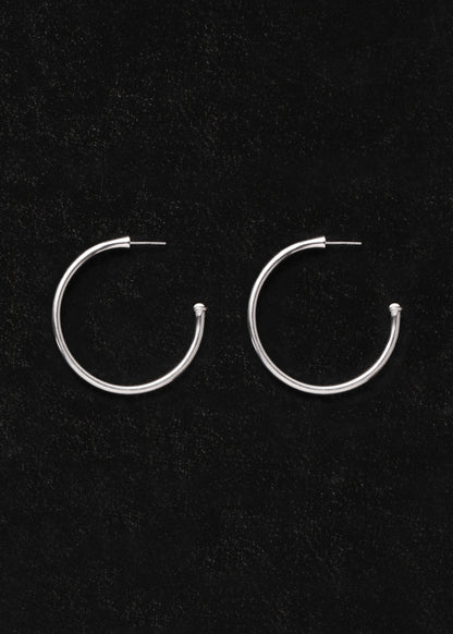 Large Ox Bone signature hoop earrings by RIVERLAKE, showcasing a smooth, elegant design with a timeless style.