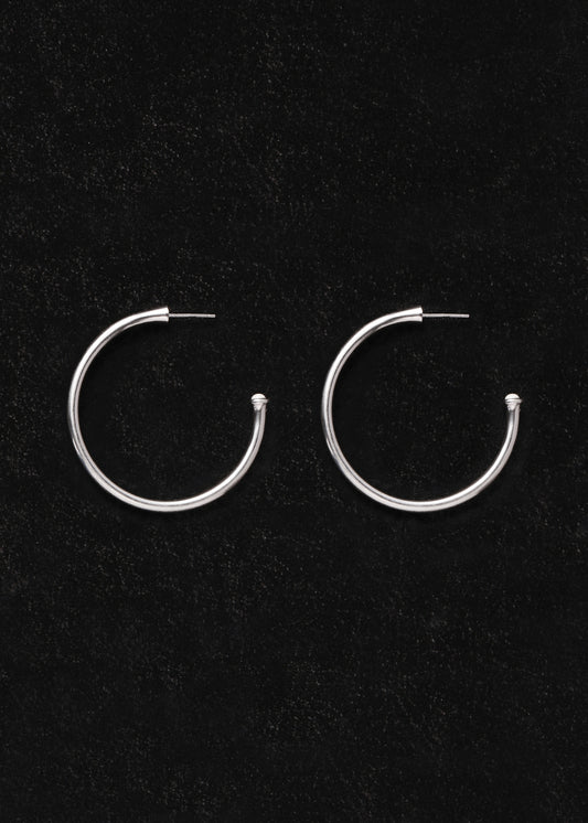 Large Ox Bone signature hoop earrings by RIVERLAKE, showcasing a smooth, elegant design with a timeless style.