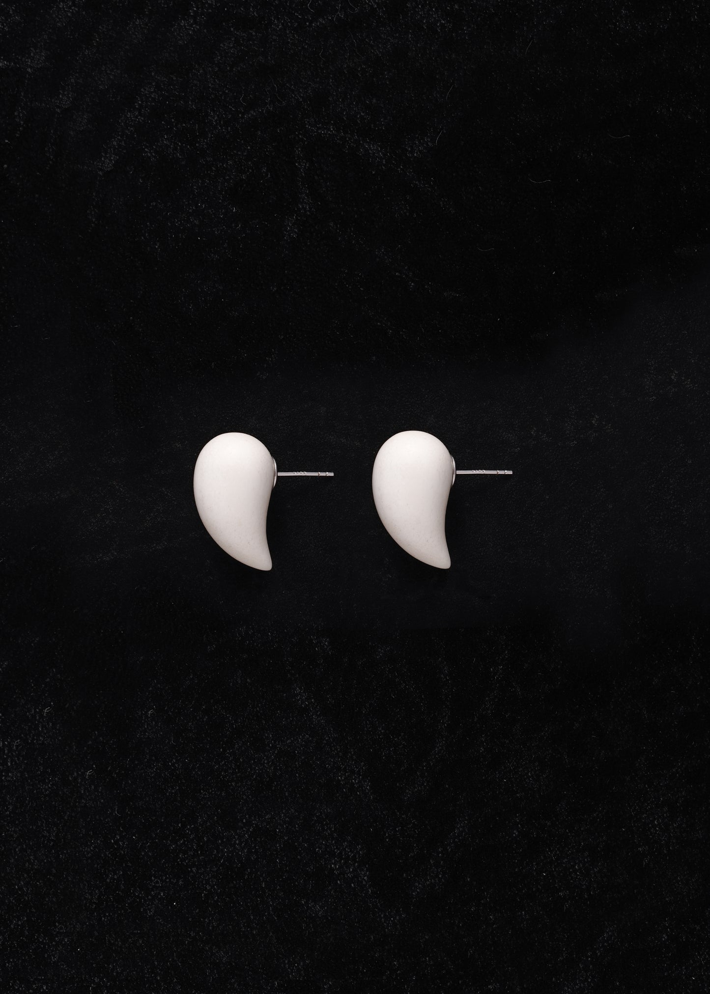 Small antler fang earrings by RIVERLAKE, featuring a delicate design with a natural finish.