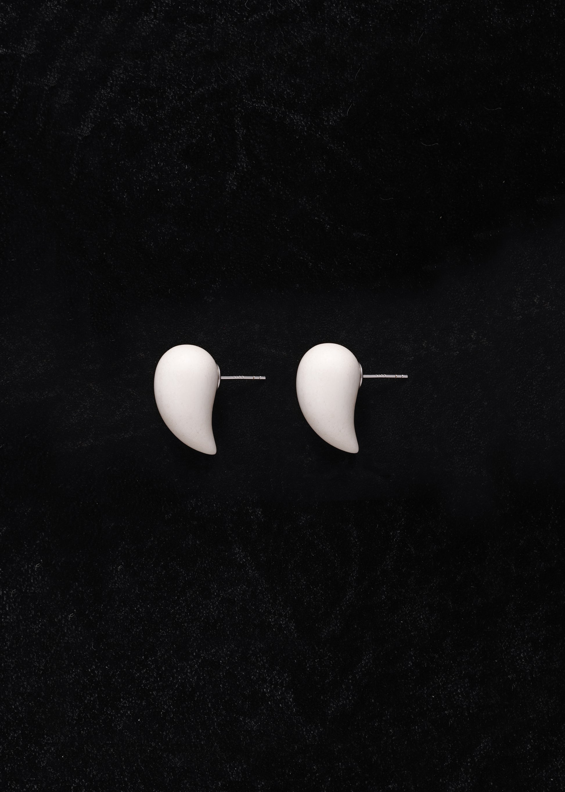 Small antler fang earrings by RIVERLAKE, featuring a delicate design with a natural finish.