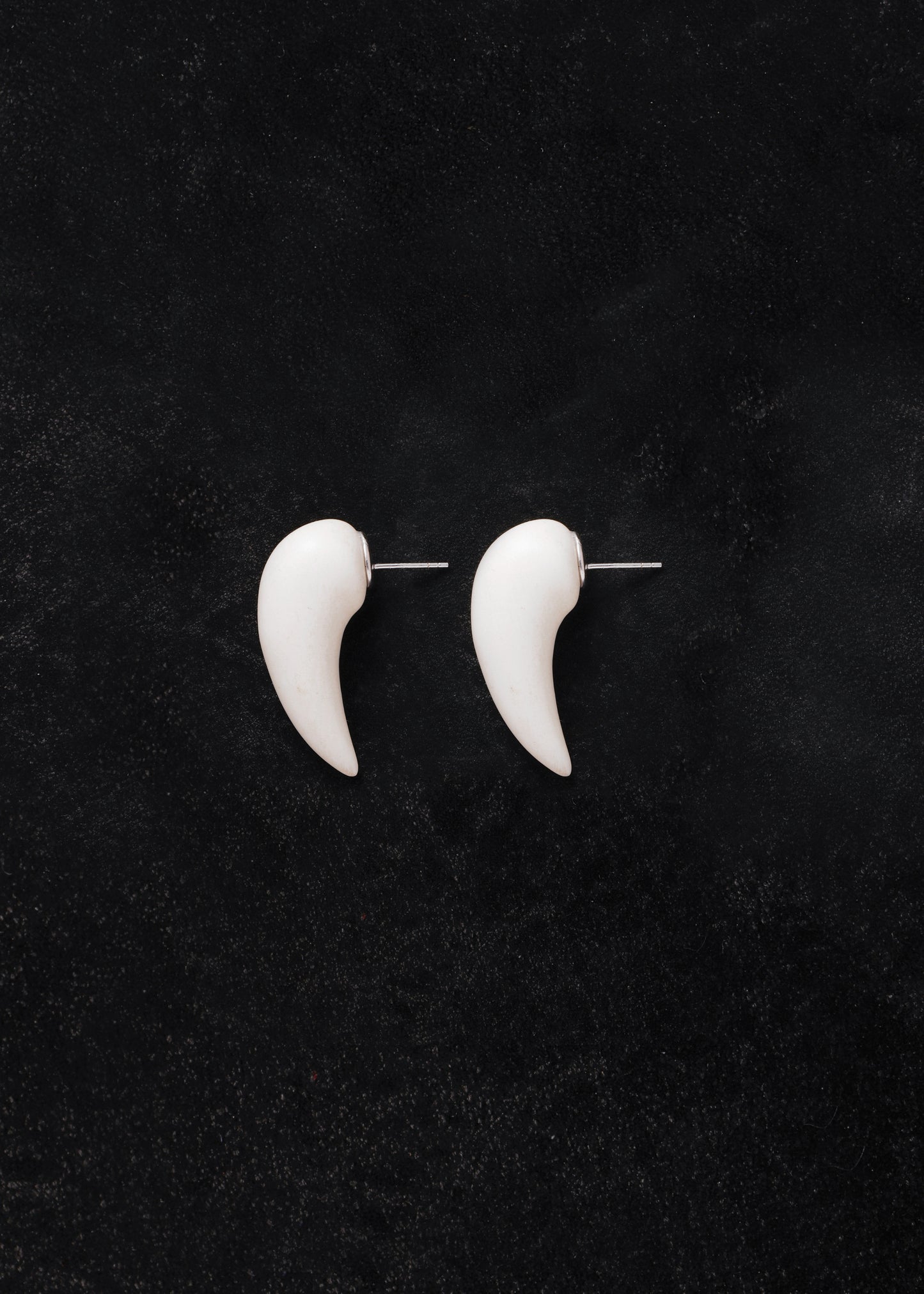 Medium antler fang earrings by RIVERLAKE, featuring a unique design in white, perfect for adding flair to any outfit.