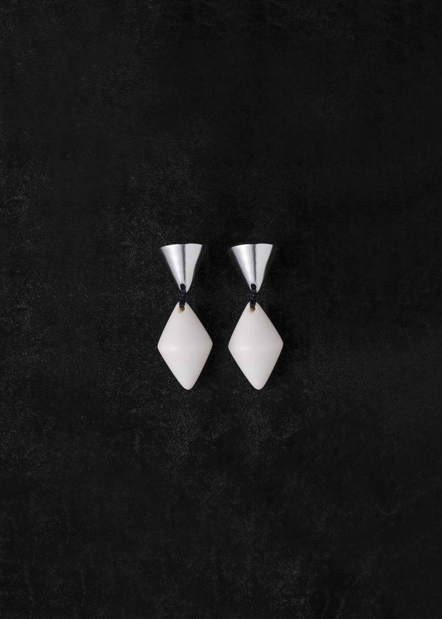 RIVERLAKE cone drop earrings in antler with elegant design and smooth finish, showcasing a modern, minimalist style.