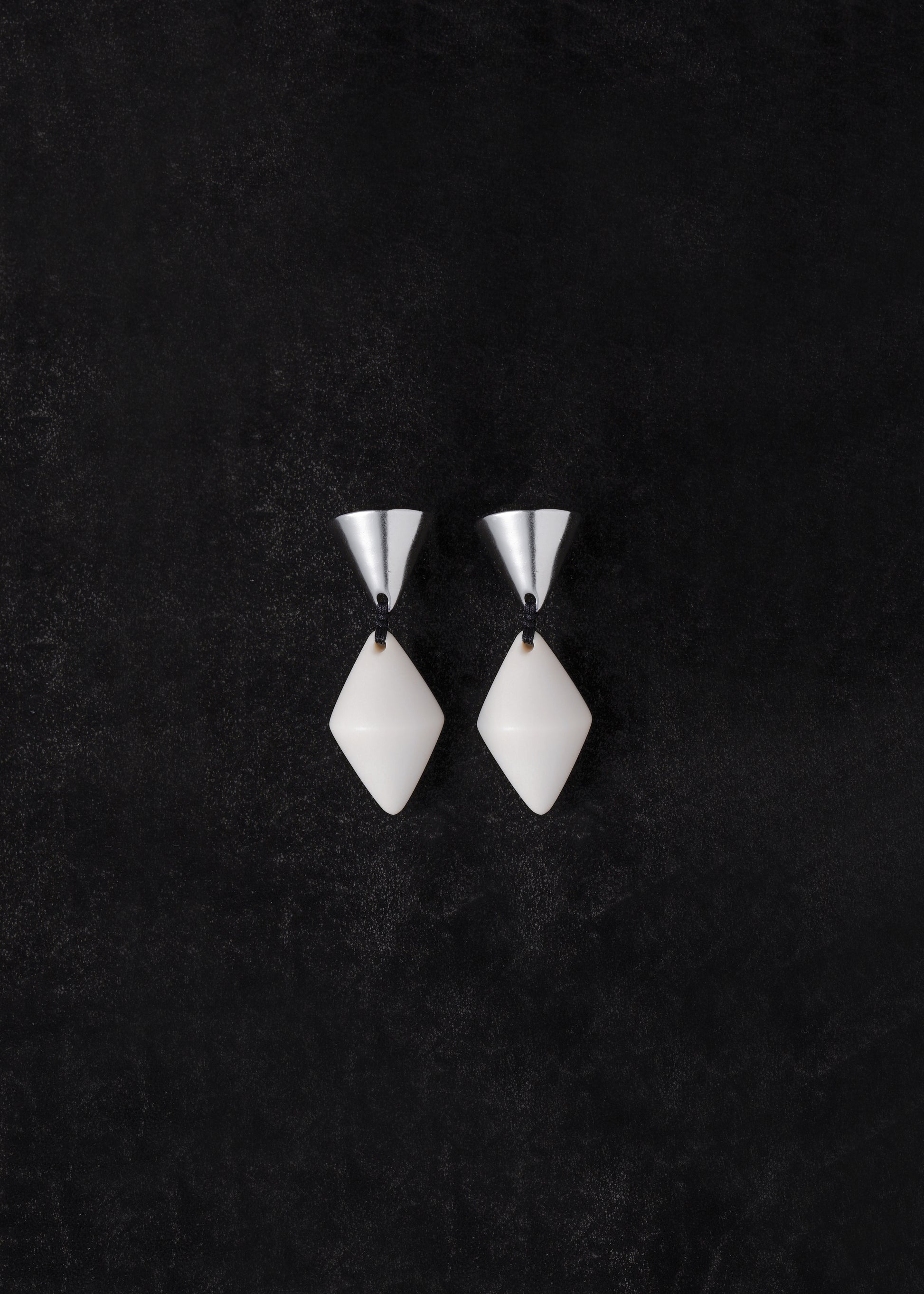 RIVERLAKE cone drop earrings in antler with elegant design and smooth finish, showcasing a modern, minimalist style.