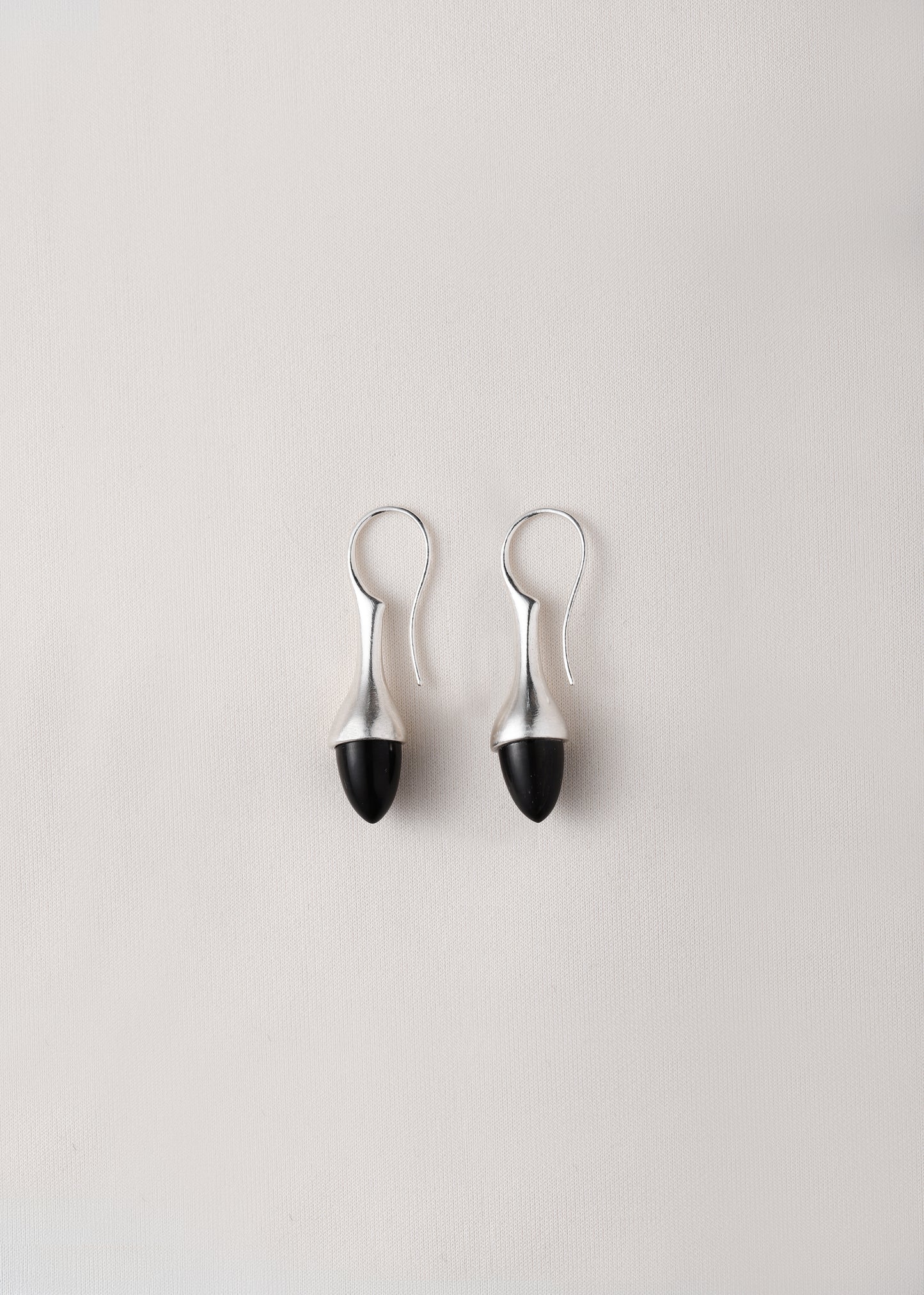 Black buffalo horn Dewdrop earrings by RIVERLAKE, showcasing a unique, elegant design with a glossy finish.